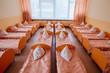 Cots in the kindergarten. Orphanage or boarding school. Beds in a boarding school or in an orphanage