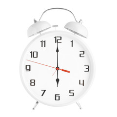 White alarm clock showing six o'clock isolated on white background