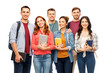 © Syda Productions - education, high school and people concept - group of smiling students with books over white background
