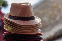 Stack Of Straw Fedora Hats