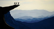 © emerald_media - successful climbers on the summits of high mountains