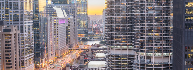 Wall Mural - Panorama3 aerial view of skyline along Chicago river through downtown at sunset