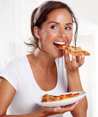 Wall Mural - WOMAN EATING PIZZA