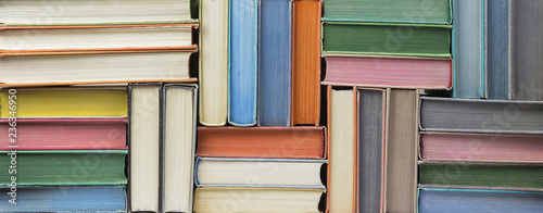 Cuadros en Lienzo Many old books stacked in texture