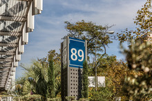 View Of A Metal Tower Announcing The Number 89