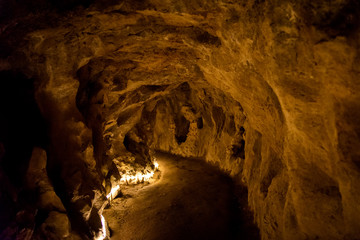 Very old tunnel through mountain rock