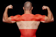 © Виталий Сова - The back of a young athletic man wearing a T-shirt with the national flag of Austria on a black isolated background. The concept of national pride and patriotism