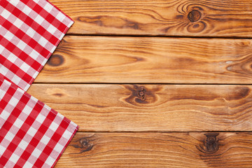 checkered tablecloth on wooden table