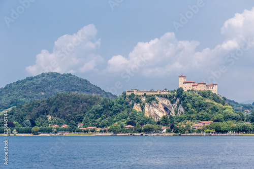 Fotografie, Obraz View of the fortress Rocca of Angera, as seen across Lake Maggiore