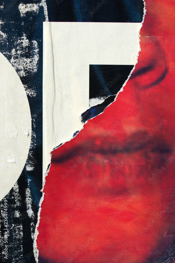 Old grunge ripped torn vintage collage street posters creased crumpled paper surface placard texture background backdrop