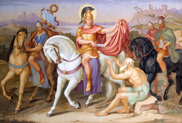 Saint Martin of Tours cuting a piece of his cloak for a beggar, fresco in the Saint Martin church in Unteressendorf, Germany