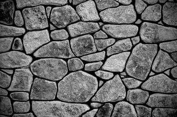 Textured stone wall in black and white