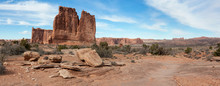 Panoramic Landscape View Of Beautiful Red Rock Canyon Formations During A Vibrant Sunny Day. Taken In Arches National Park, Located Near Moab, Utah, United States.