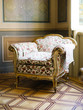 © Dreamwood - Michael & Lucy/Stocksy - Ornamental beautiful armchair
