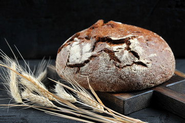 rye bread, whole loaf and ears