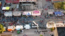 Drone, Flying Sideways, Over People At Street Fair In Pennsylvania
