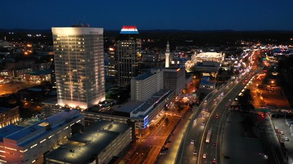 Wall Mural - Rush Hour Traffic Moves Around The Waterfront Downtown Skyline Sprigfield Massachusetts