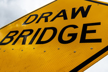 Abstract Dirty Dingy Draw Bridge Sign Close Up