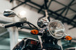 © MyMicrostock/Stocksy - Handlebar of a custom motorbike