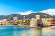 Beautiful view of coastline and picturesque seaside village Rapallo. Little harbor and houses.