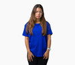© Krakenimages.com - Young beautiful brunette woman wearing blue t-shirt over isolated background depressed and worry for distress, crying angry and afraid. Sad expression.