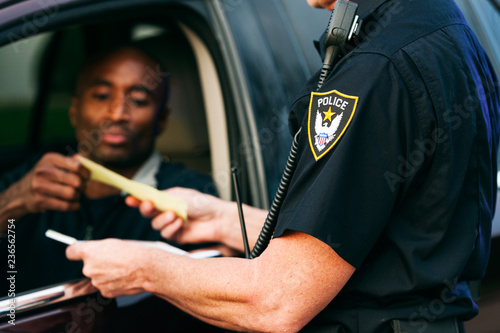 Obraz na plátně Police: Driver Gets Speeding Ticket From Officer