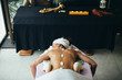 © Javier Pardina/Stocksy - Woman treatment at spa center.