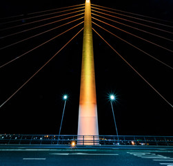 Wall Mural - illuminated central pylon of cable suspension bridge
