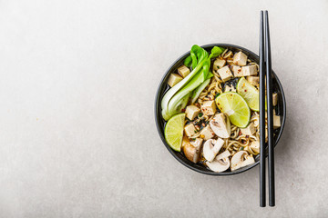 Tofu asian vegetarian soup served in bowl