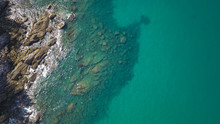 Aerial Drone Top View Of Transparent Shallow Water And Sea Ocean Surface