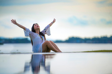 young happy and attractive Asian Chinese woman enjoying Summer h