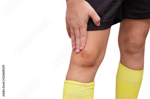 Fotografía Child hurt his knee while playing football