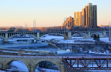 Urban City Architecture Background. Beautiful Winter Morning In Minneapolis. Cityscape With Bridges Over Mississippi River And Saint Anthony Falls. Minnesota, Midwest USA.