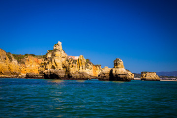 Wall Mural - Rugged shore line of Lagos Portugal
