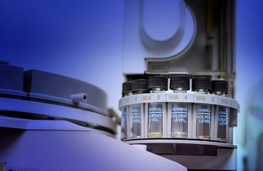Wall Mural - quality control laboratory medicine by equipment. vials on autosampler of gas chromatography-mass sp