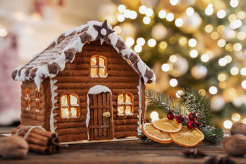 Gingerbread house on the christmas table with copy space