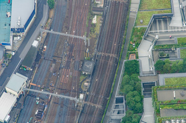 Aerial view of Tokyo cityscape from high above. Railroad tracks from above in city.