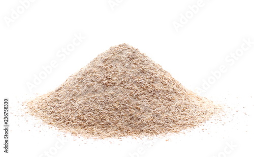 Cuadros en Lienzo Pile of integral wheat flour isolated on white background