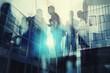 © alphaspirit - Silhouette of business people working together in office. Concept of teamwork and partnership. double exposure with light effects
