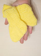 © sergei - a little yellow knitted socks are on hand