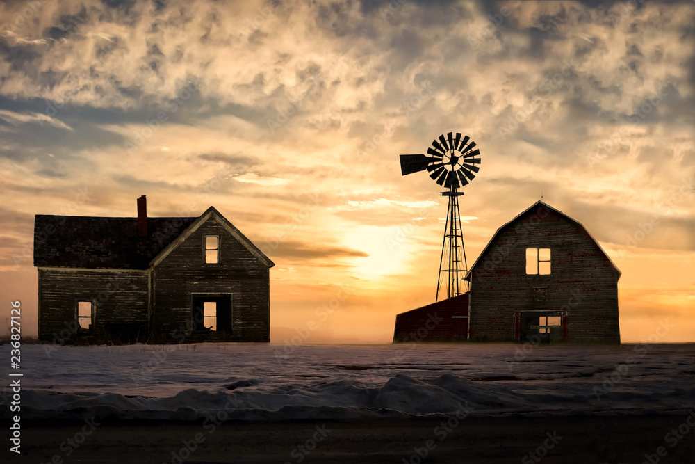 old abandoned silhoetted house and barn with beautiful sunset - obrazy, fototapety, plakaty 