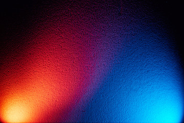 Two gradient rays of light in red and blue