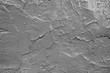 The texture of the old cracked wall. Painted in grey.