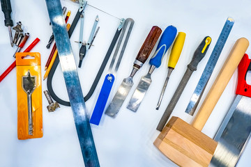 Poster - Carpenter tool set. Tool carpenter. Chisel. Jigsaw on wood. A carpenter. Joiner.