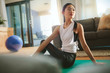 © Jacob Lund - Chinese woman doing yoga exercise at home
