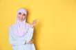 © New Africa - Portrait of young Muslim woman in hijab against color background. Space for text