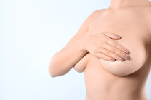 Woman Covering Her Breast And Space For Text On White Background, Closeup. Self Examination