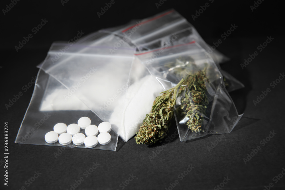 Cocaine, dried hemp and ecstasy on grey table - obrazy, fototapety, plakaty 