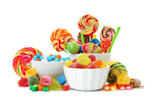Composition With Many Different Yummy Candies On White Background