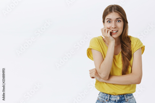 Concerned Panicking Timid And Insecure Attractive Young Woman In